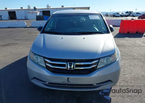 2014 Honda Odyssey Lx z USA, uszkodzony, nr VIN 5FNRL5H23EB006174